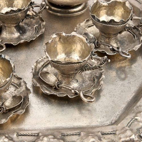 389 - Â§ AN AUSTRO-HUNGARIAN SILVER COFFEE SERVICE by BrÃ¼der Frank, Vienna, c.1900, in a rusticated tromp... 