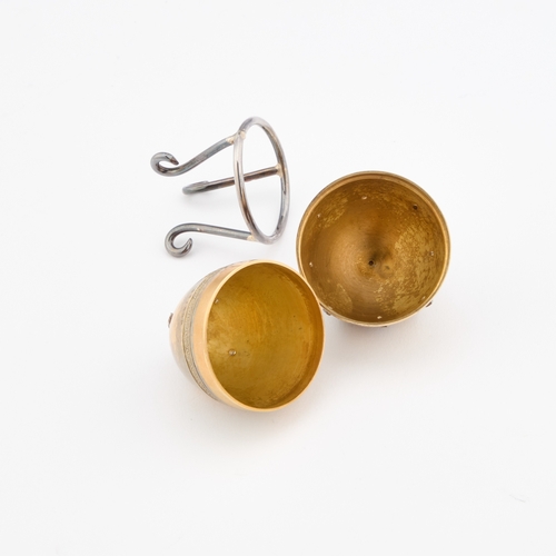 425 - A FABERGÃ STYLE PARCEL-GILT SILVER EGG by St James House Company, London 1982, the egg-shaped box o... 