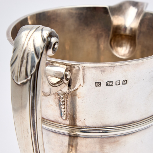 473 - A SILVER REPLICA OF A WILLIAM AND MARY EWER by Richard Comyns, London 1931, retailed by Mallett &... 