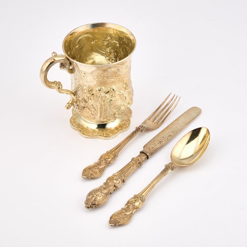 494 - A VICTORIAN SILVER-GILT CHRISTENING SET the mug by James Charles Edington, London 1852; the knife, f... 