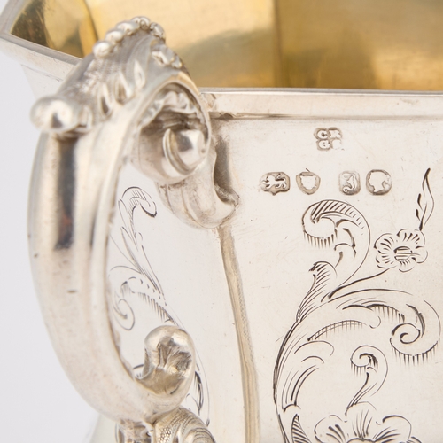 515 - AN EARLY VICTORIAN SILVER MUG by Charles Reily & George Storer, London 1844, of waisted octagona... 