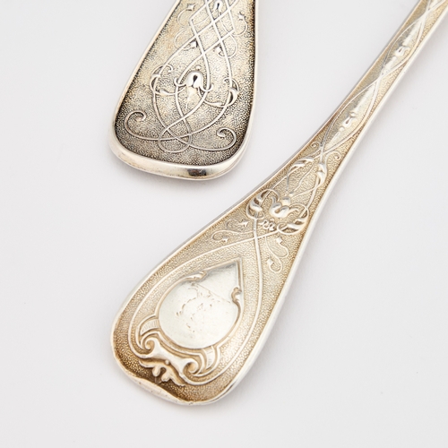 531 - A PAIR OF VICTORIAN SILVER SERVING SPOONS by Francis Higgins II, London 1858, each with gilded shell... 