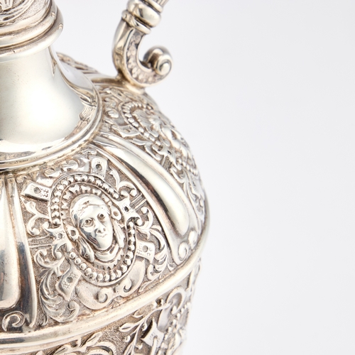 538 - A VICTORIAN SILVER CLARET JUG by Mappin & Webb Ltd, London 1901, after Cellini, chased with mask... 