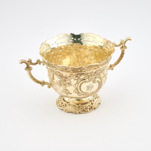 560 - A FINE VICTORIAN SILVER-GILT CASED SET COMPRISING TWO-HANDLED BOWL, FORK, SPOON AND KNIFE the bowl, ... 