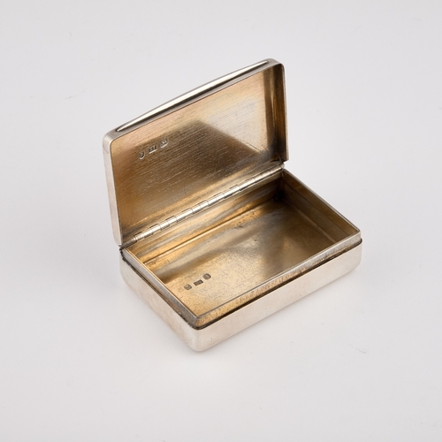 563 - A VICTORIAN SILVER SNUFF BOX by Edward Smith, Brimingham 1858, of rounded rectangular form, the hing... 