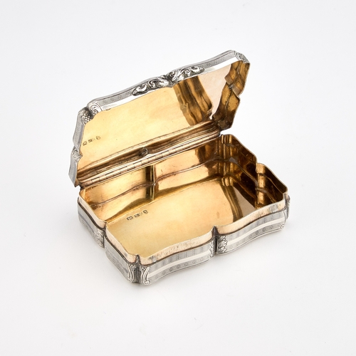 574 - A VICTORIAN SILVER SNUFF BOX by Nathaniel Mills, Birmingham 1846, of shaped rectangular form, engine... 