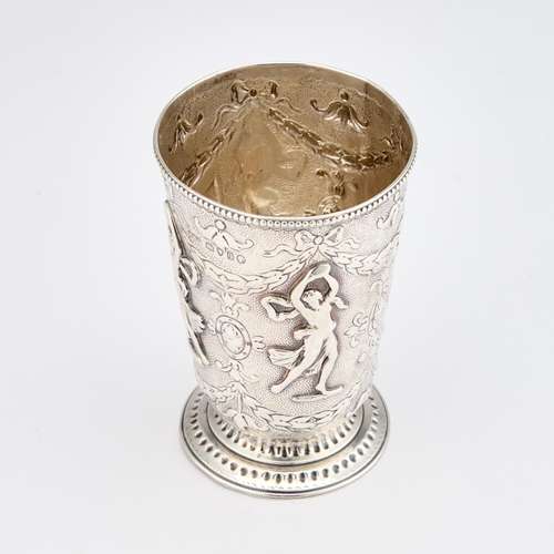 575 - A VICTORIAN SILVER BEAKER by Henry William Curry, London 1871, the tapering deep bowl chased with Cl... 