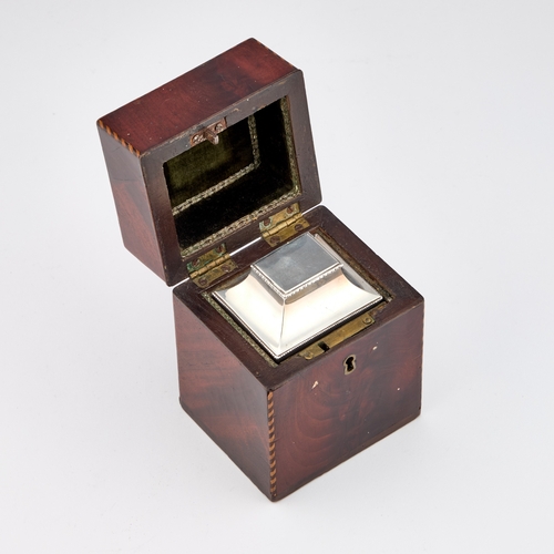 588 - A GEORGE III MAHOGANY CASED SILVER TEA CADDY maker TL, London 1771, the caddy of rectangular section... 