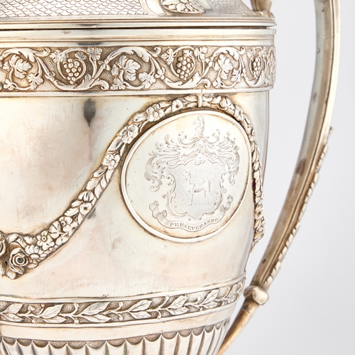 598 - A GEORGE III SILVER-GILT TWO-HANDLED CUP AND COVER by William Holmes, London 1801, the trophy in the... 