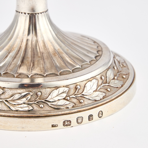 598 - A GEORGE III SILVER-GILT TWO-HANDLED CUP AND COVER by William Holmes, London 1801, the trophy in the... 