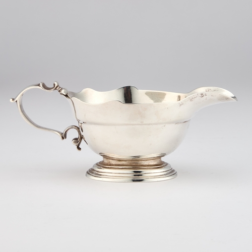 638 - A PAIR OF GEORGE II SILVER SAUCEBOATS by William Paradise, London 1729, oval form with a wavy-edge b... 