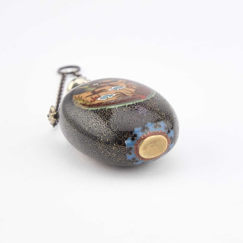 1001 - A JAPANESE CLOISONNÃ ENAMEL SCENT BOTTLE ovoid, enamelled to the front with a scaly dragon pursuing... 