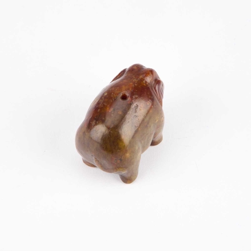 1010 - A CHINESE JADE TOGGLE carved as an elephant standing four-square. 4cm high