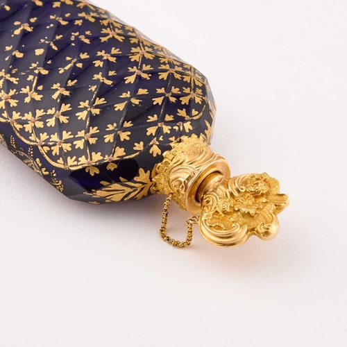 1020 - A LATE 18TH CENTURY GOLD-MOUNTED, BRISTOL BLUE GLASS AND GILT DECORATED SCENT BOTTLE DECORATED IN TH... 