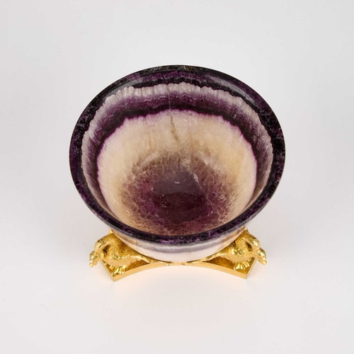 1023 - AN ORMOLU-MOUNTED BLUE JOHN BOWL the triform base with three swans, their wings outstretched support... 