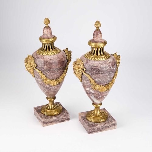 1079 - A PAIR OF FRENCH ORMOLU-MOUNTED MARBLE CASSOLETTES each domed 'cover' with a pine cone finial above ... 