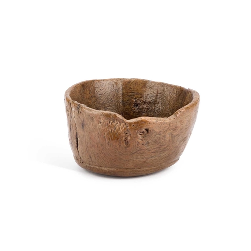 108 - AN EARLY TREEN BOWL, PROBABLY 17TH CENTURY 16.5cm diameter