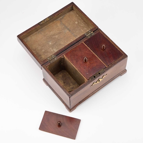 12 - A GEORGE III MAHOGANY TEA CADDY the interior with three lidded compartments, fitted with a brass han... 