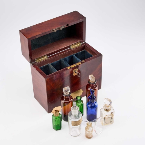 120 - A 19TH CENTURY MAHOGANY APOTHECARY BOX rectangular, containing various glass bottles, the base drawe... 