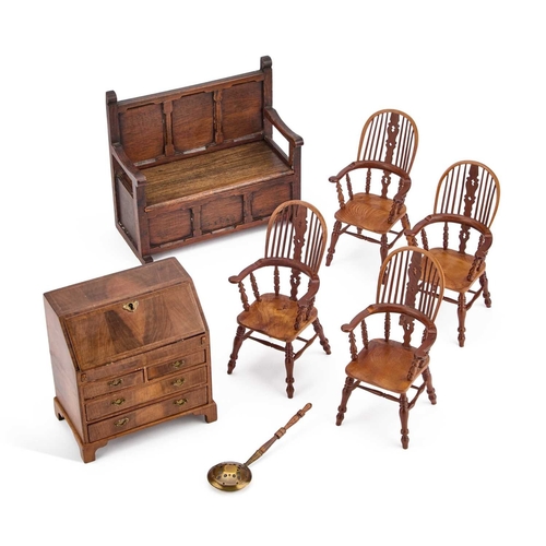 123 - SIX PIECES OF MINIATURE FURNITURE comprising four Windsor chairs, a bureau and a settle; along with ... 