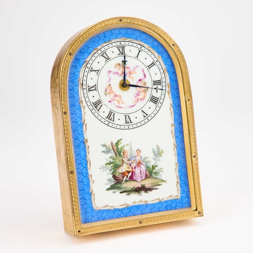 1239 - A 19TH CENTURY GILT-BRASS AND PORCELAIN STRUT CLOCK the arch-top case containing a porcelain face pa... 