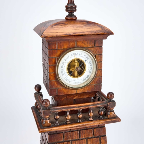 1243 - A LATE VICTORIAN CARVED OAK TOWER-SHAPED CLOCK with an aneroid barometer inset to the top, the body ... 