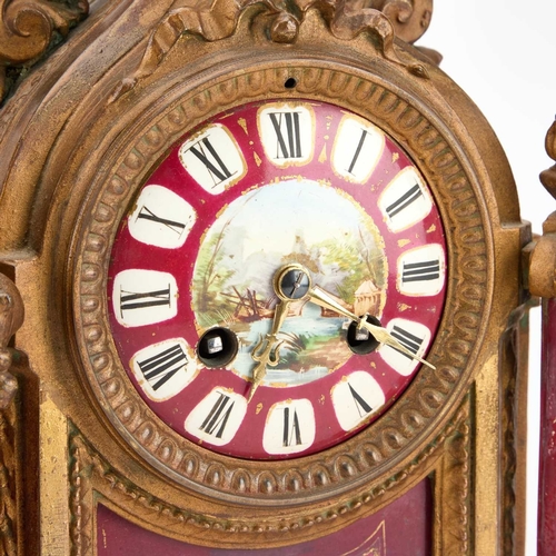 1246 - A LATE 19TH CENTURY FRENCH GILT-METAL AND MAGENTA-GROUND PORCELAIN CLOCK GARNITURE the clock elabora... 