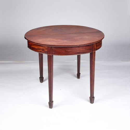 1295 - A GEORGE III MAHOGANY DEMILUNE FOLDOVER TEA TABLE raised on square-section tapering legs. 73cm high,... 