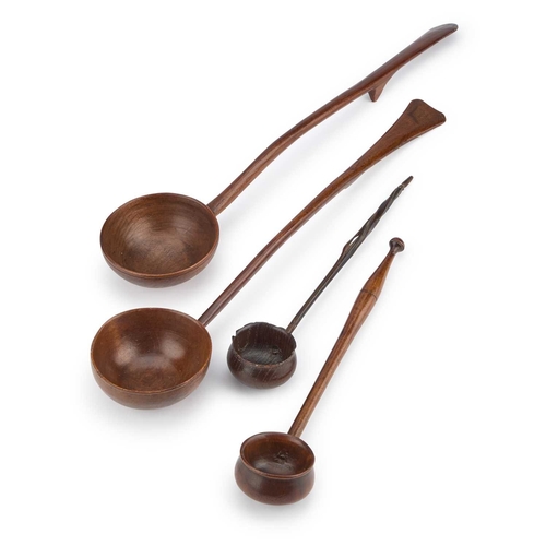 130 - FOUR TREEN TODDY LADLES including an example with a baleen handle, etc. (4) Largest 30cm long