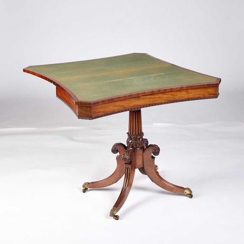 1324 - A REGENCY MAHOGANY FOLDOVER CARD TABLE with a concave front, raised on a reeded pedestal with a leaf... 