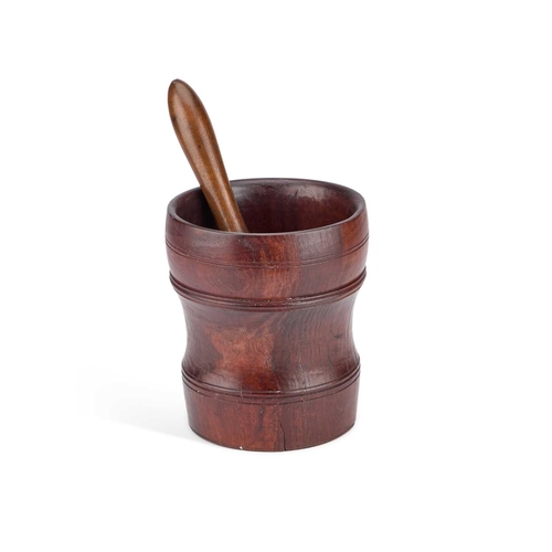 147 - A EARLY 18TH CENTURY LIGNUM VITAE MORTAR TOGETHER WITH A PESTLE (2) Mortar 17.5cm high