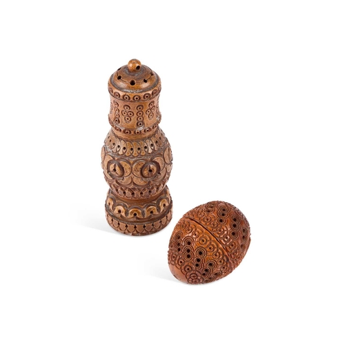 172 - A 19TH CENTURY CARVED COQUILLA NUT POUNCE POT in three parts with a stanhope viewer finial; together... 