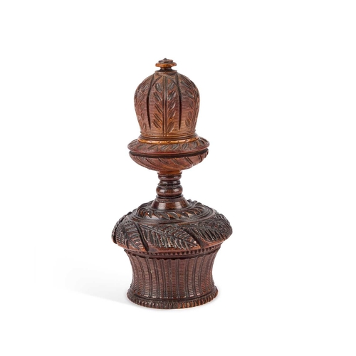 186 - A 19TH CENTURY CARVED COQUILLA NUT COMBINATION NUTMEG GRATER AND BOX the top section as an acorn pat... 