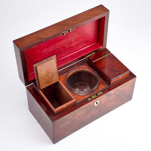 229 - A GEORGE III MAHOGANY TEA CADDY rectangular, the flame mahogany case containing a pair of lidded can... 