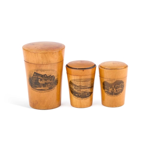 241 - THREE MAUCHLINE WARE GLASS HOLDERS each decorated with a titled and printed scene. (3) Tallest 10.5c... 