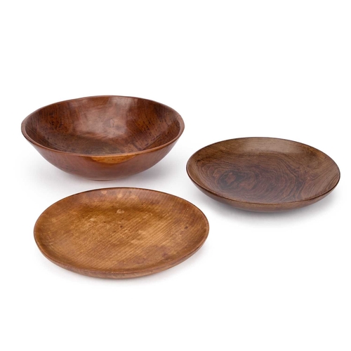 250 - A TREEN BOWL AND TWO TREEN PLATES (3) Bowl 27.5cm diameter