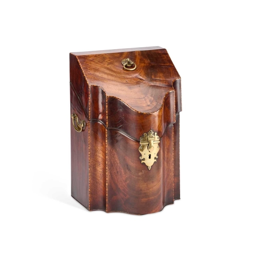 27 - A GEORGE III MAHOGANY KNIFE BOX of typical form, with a brass axe-head handle, side handles and escu... 