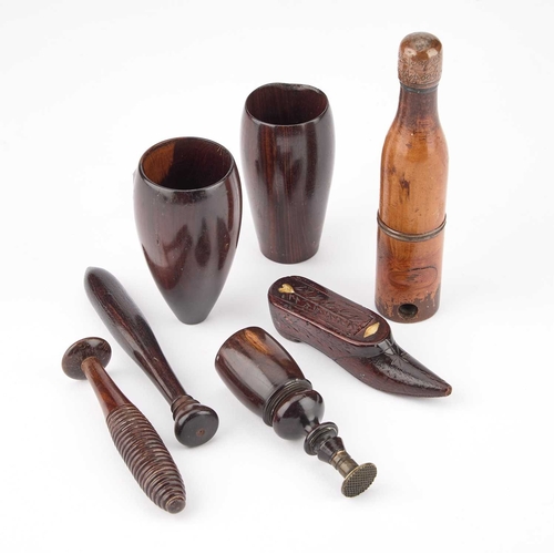 270 - A VICTORIAN NOVELTY TREEN PIPE in the form of a bottle, unscrewing to form a pipe, the top of the bo... 