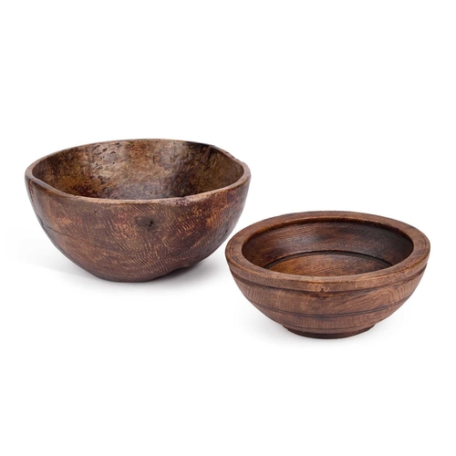 276 - TWO TREEN BOWLS (2) Largest 28cm diameter