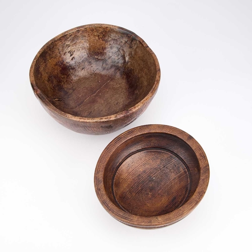 276 - TWO TREEN BOWLS (2) Largest 28cm diameter