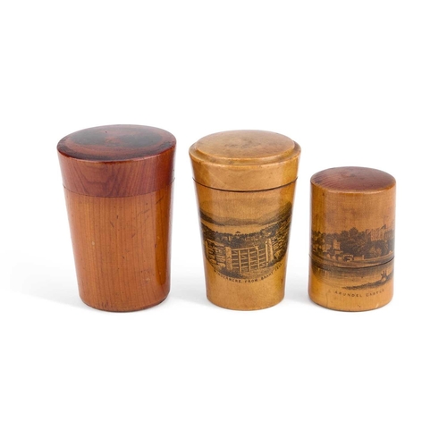 28 - TWO MAUCHLINE WARE GLASS HOLDERS AND A CYLINDRICAL BOX each decorated with a titled and printed scen... 