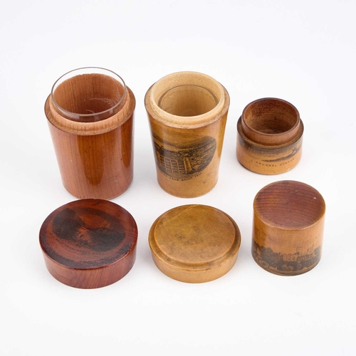 28 - TWO MAUCHLINE WARE GLASS HOLDERS AND A CYLINDRICAL BOX each decorated with a titled and printed scen... 