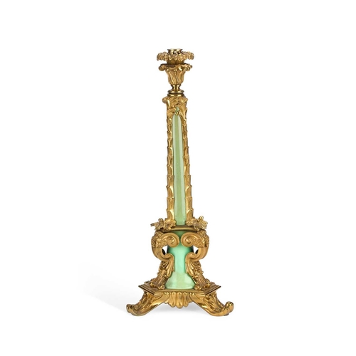 290 - A GILT-METAL AND POTTERY LAMP BASE the tapering stem with three leaf-cast supports issuing from a tr... 