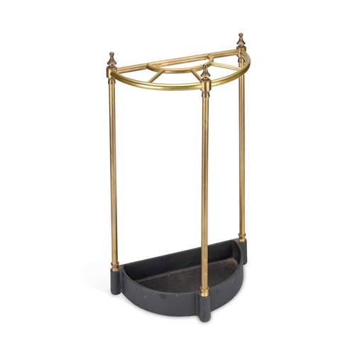 291 - A BRASS AND CAST IRON STICKSTAND demilune. 64.5cm high