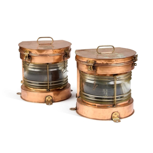 292 - A PAIR OF SEAHORSE BRASS AND COPPER SHIPS MASTHEAD LANTERNS each labelled and numbered. (2) 34cm hig... 