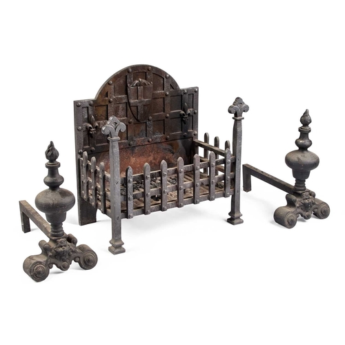 296 - A CAST IRON FIRE BASKET AND ANDIRONS the grate with an arched back panel. (3) 56cm high