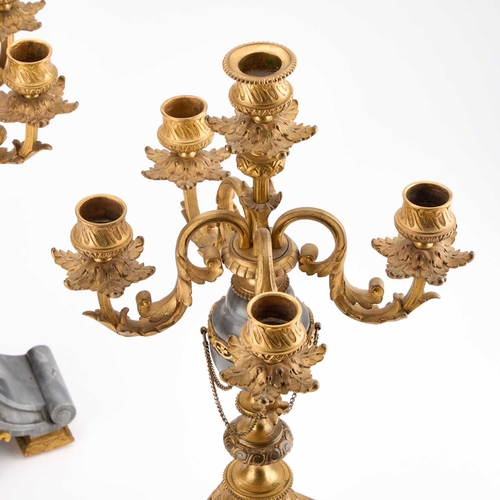 299 - A PAIR OF LOUIS XVI STYLE GREY MARBLE AND ORMOLU FIVE-LIGHT CANDELABRA each with four scroll-form le... 