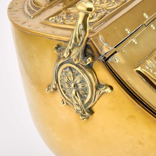 302 - A GOOD VICTORIAN BRASS COAL BUCKET helmet-shaped, complete with the original shovel, the handle with... 