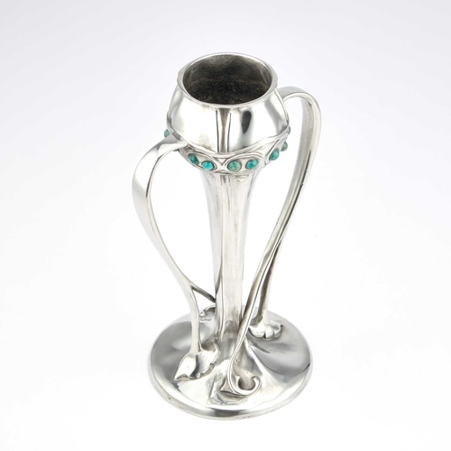 318 - ARCHIBALD KNOX (1864-1933) FOR LIBERTY & CO, A TUDRIC PEWTER AND FAUX TURQUOISE TULIP VASE the taper... 