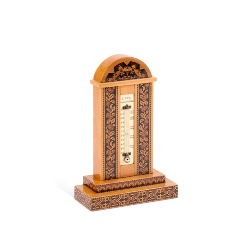 33 - Â§ A VICTORIAN TUNBRIDGE WARE DESK THERMOMETER BY EDMUND NYE the satinwood stepped base edged in geo... 